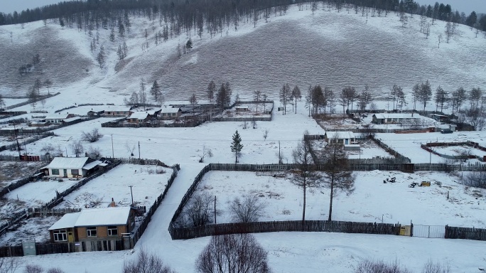 航拍大兴安岭冬季林场山村雪景