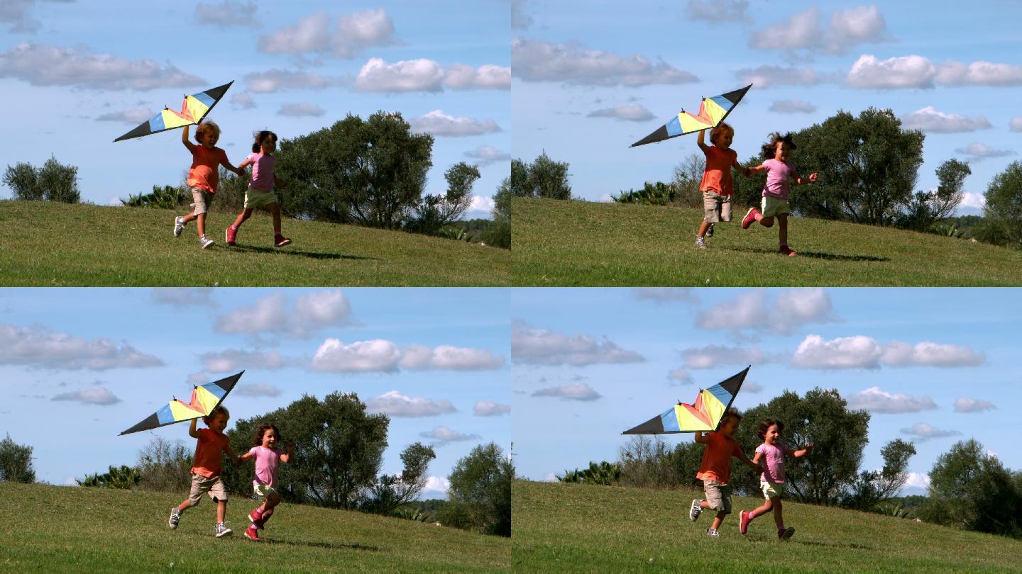 两个孩子在公园里放风筝特写