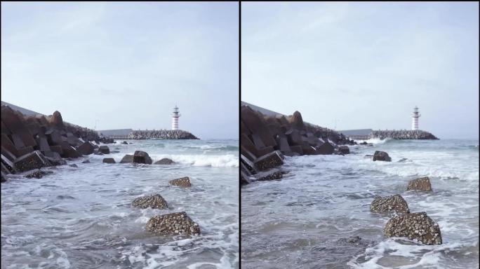 竖屏海浪拍击岸边礁石