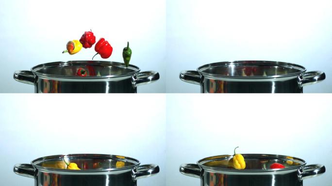 各种辣椒以慢动作落在锅里