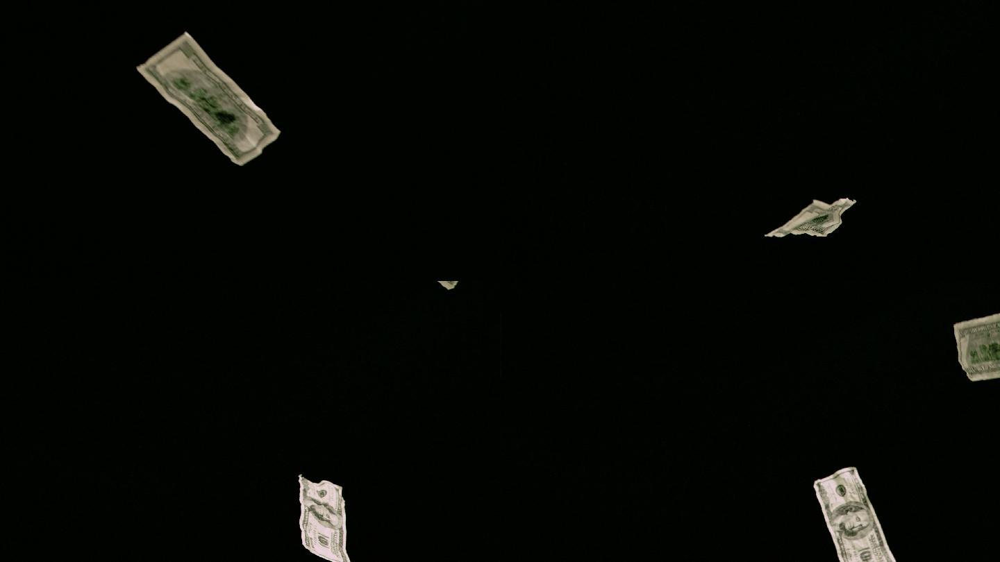 美元纸币在黑色背景下飞行特效