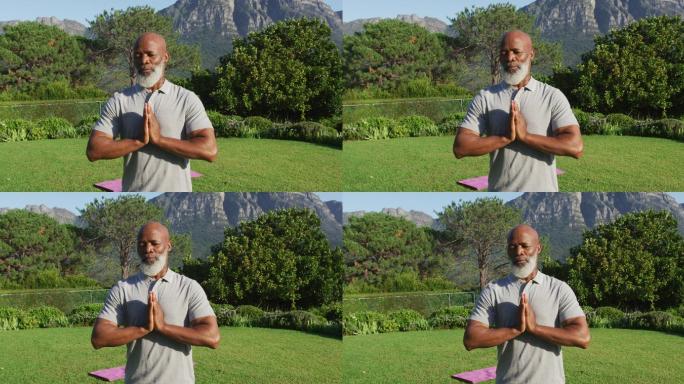 非洲裔美国老人在花园里练习瑜伽和冥想