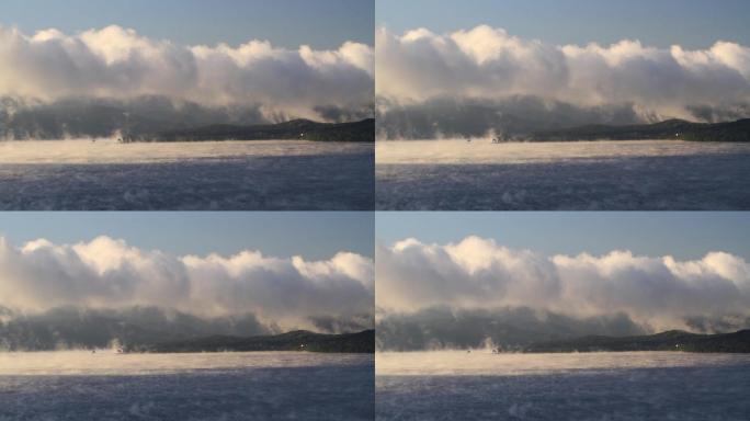 晨雾迷漫的镜泊湖云层云雾缭绕