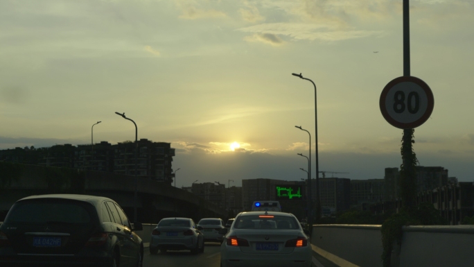 城市车流城市道路交通高架桥高架路夕阳生活