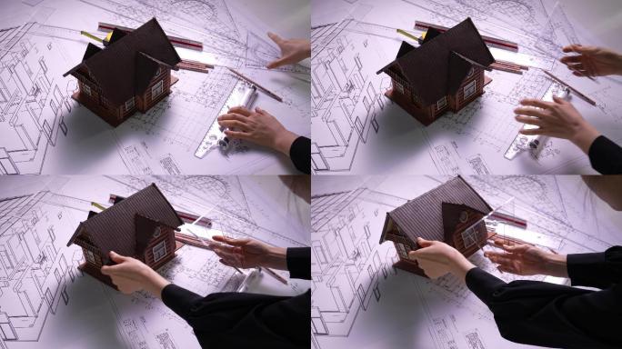 建筑设计师在图纸上绘制
