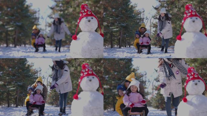 快乐家庭在雪地里玩耍