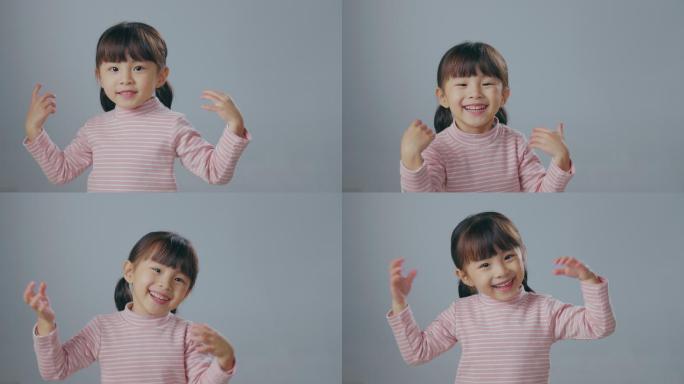 可爱的小女孩快乐童年手舞足蹈可爱小孩儿童