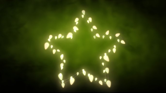 在绿色的背景上发光的星星的仙女灯