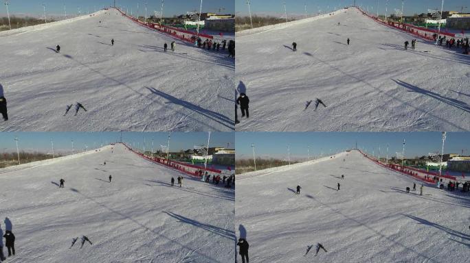 尽享冰雪魅力：航拍巴里坤滑雪场上的速度与激情