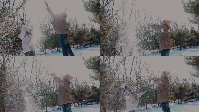 幸福情侣在雪地里玩耍