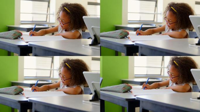 女学生坐在书桌和学习在教室4k