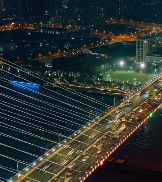 原创竖屏航拍上海南浦大桥夜景移动车流延时