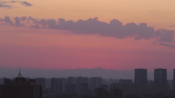 城市暮色夕阳西斜夕阳红晚霞暮色苍茫