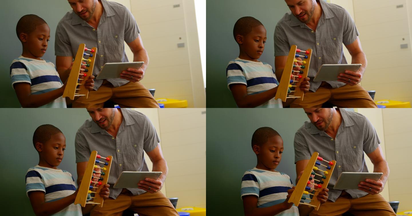 正面的年轻白人男老师教学生使用算盘在教室4k