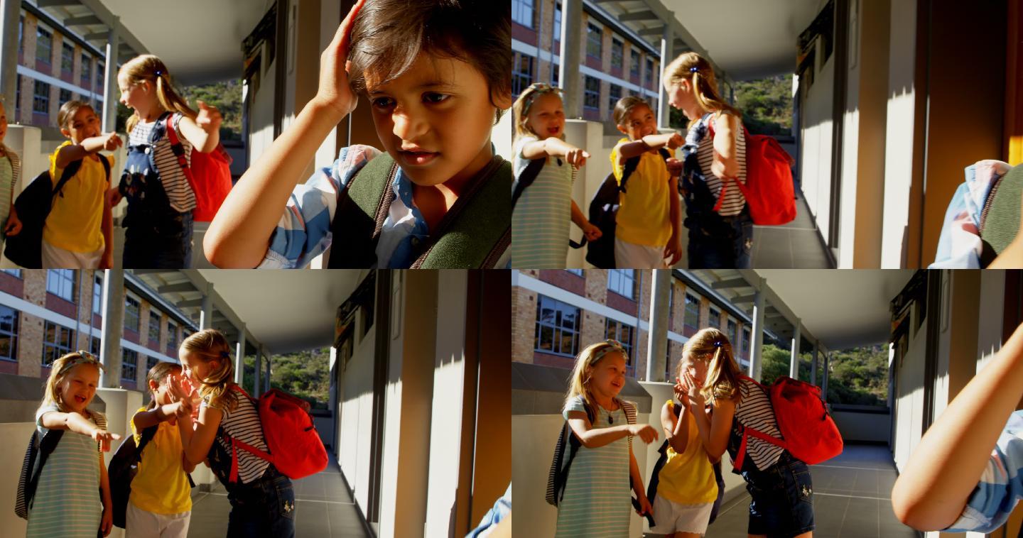 小学生在4k小学的走廊里欺负一个伤心的男孩