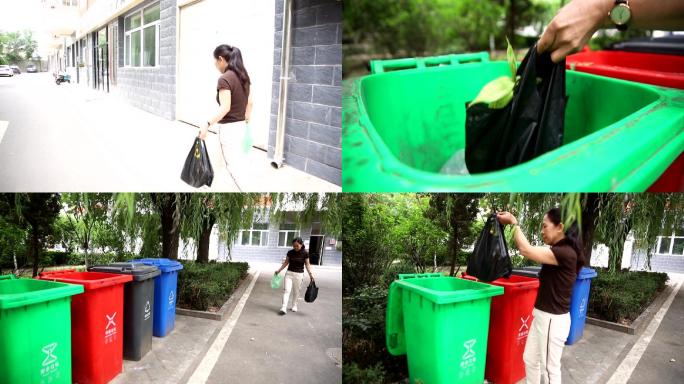 居民下楼把生活垃圾分类放垃圾桶中垃圾分类
