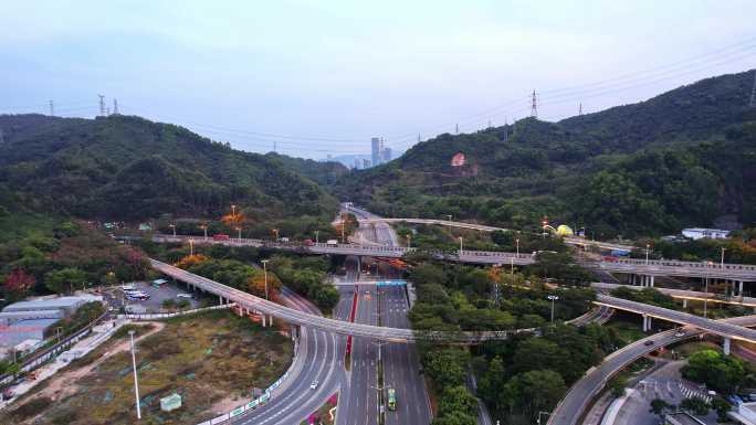 航拍深圳龙华区山丘之间绕城公路枢纽