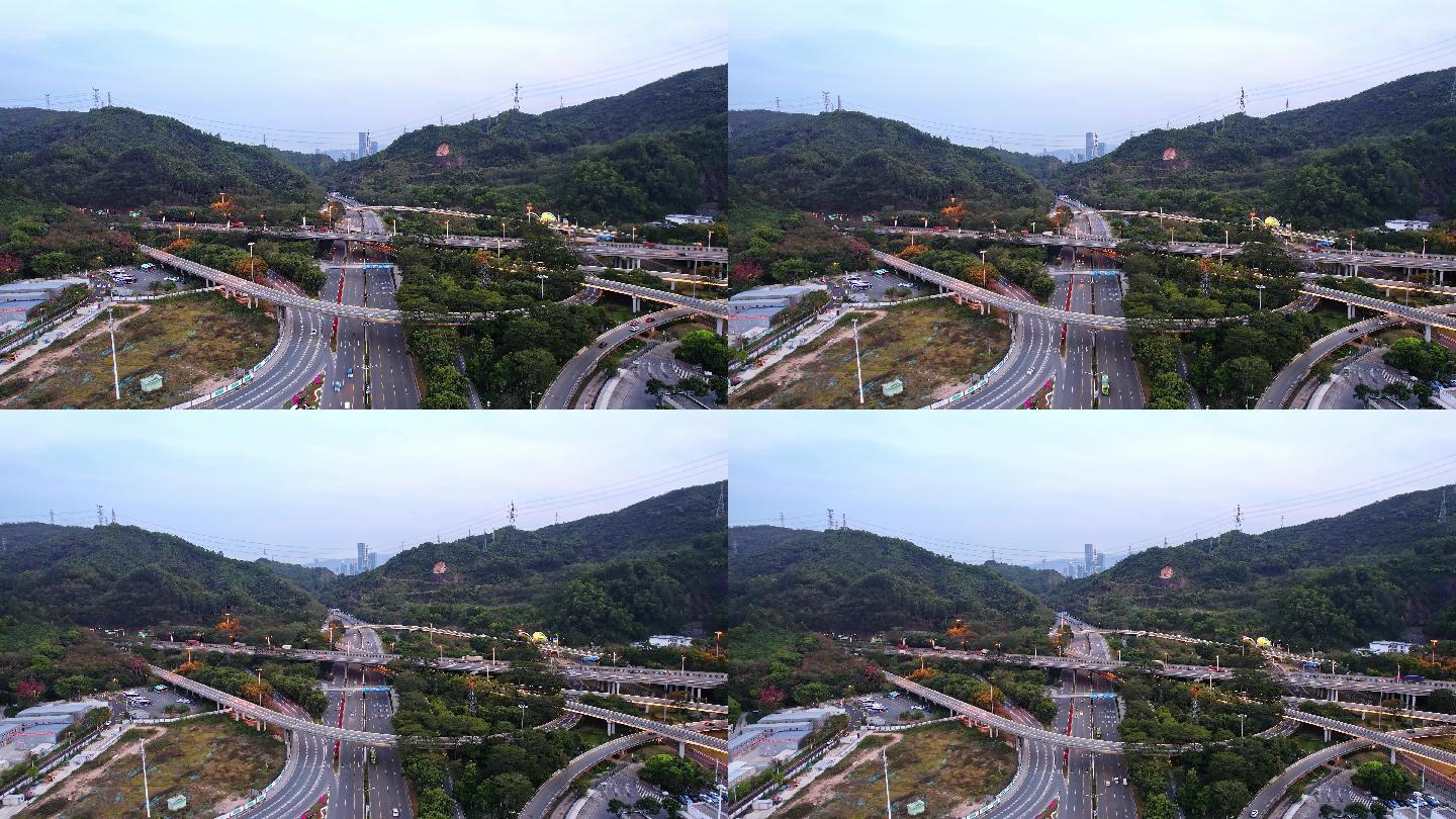 航拍深圳龙华区山丘之间绕城公路枢纽