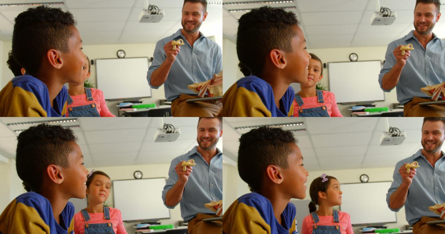成年白人男性教师解释解剖模型在教室在学校4k