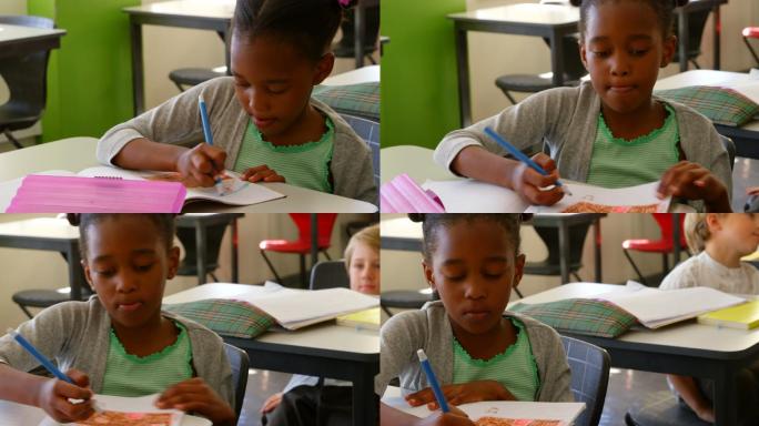 非裔美国女学生在课桌上学习在学校4k