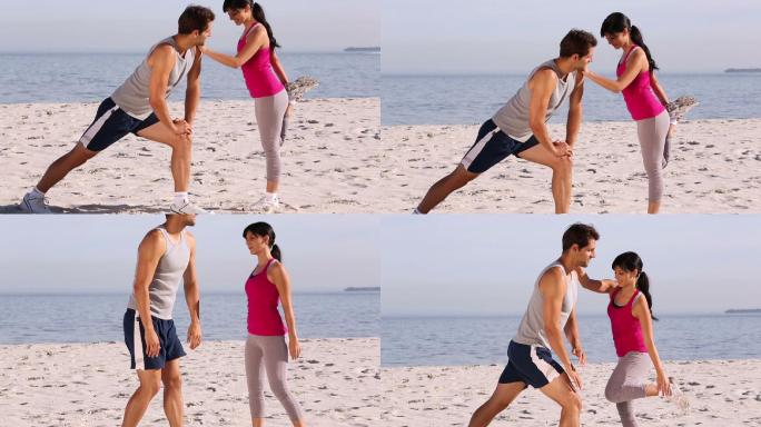 一对情侣在海滩上锻炼特写