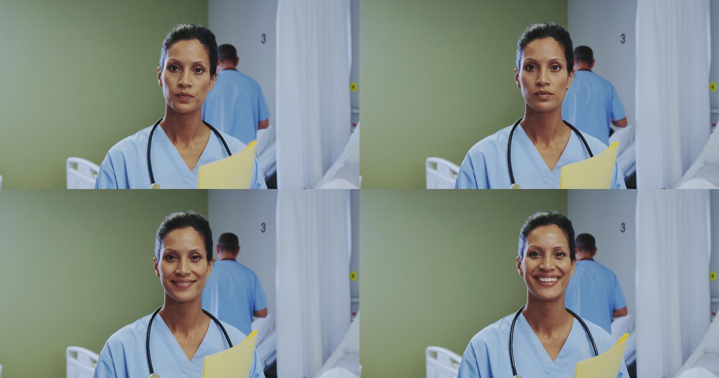 非裔美国女医生在医院病房看摄像机的正面视图