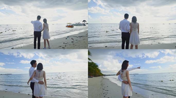 海边情侣浪漫牵手看海