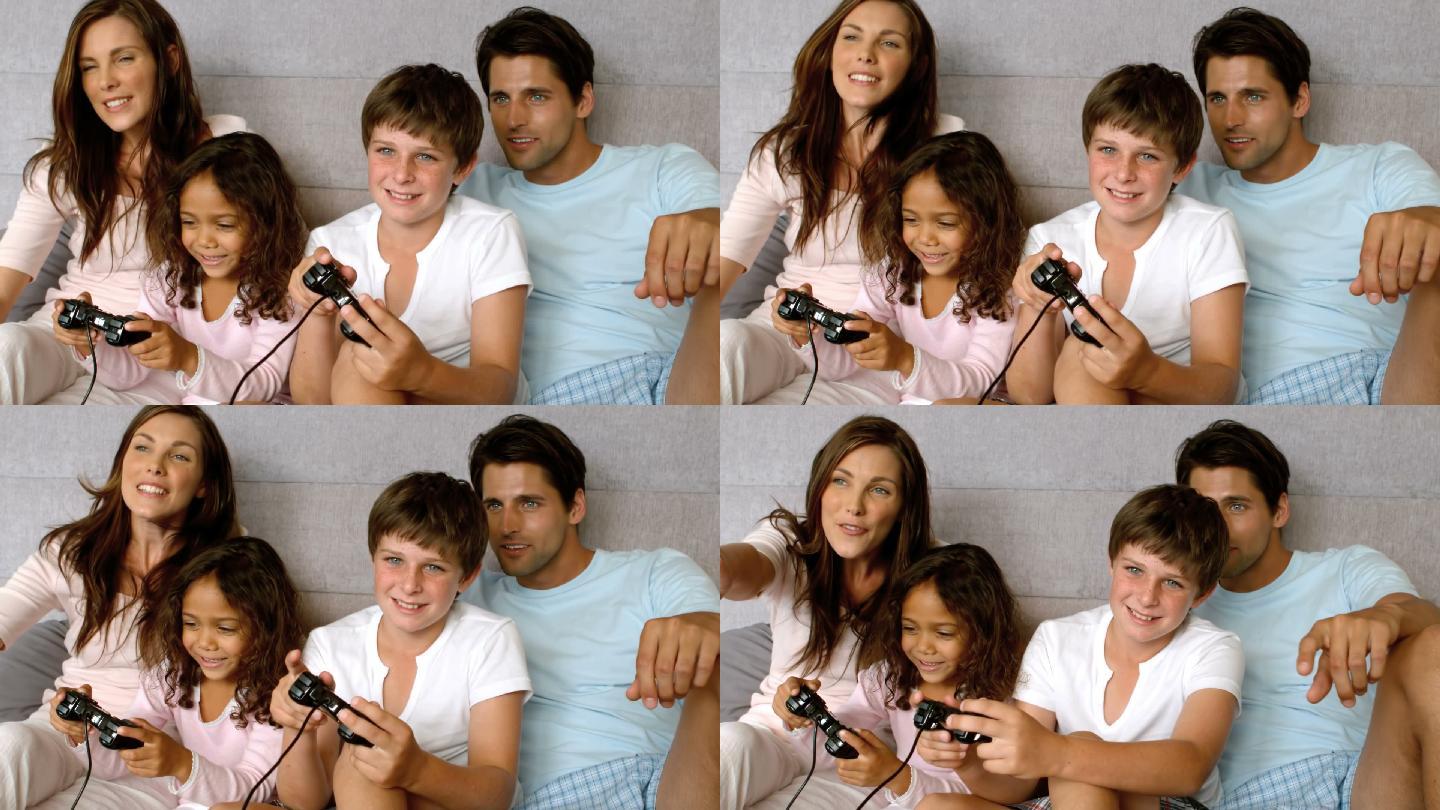 一家人在玩电子游戏特写