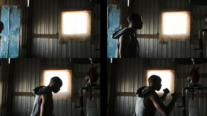 非裔美国男拳击手在健身室练习拳击4k