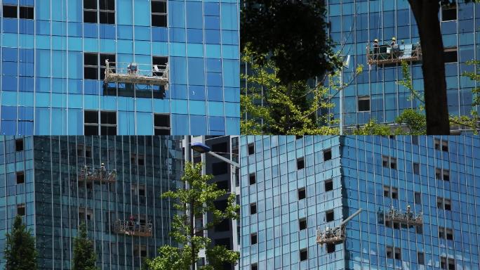 安装大厦玻璃墙的工人们
