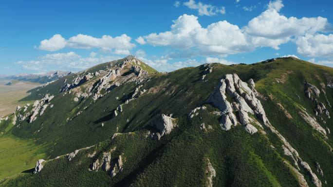 航拍青藏高原山脉山峰蓝天白云