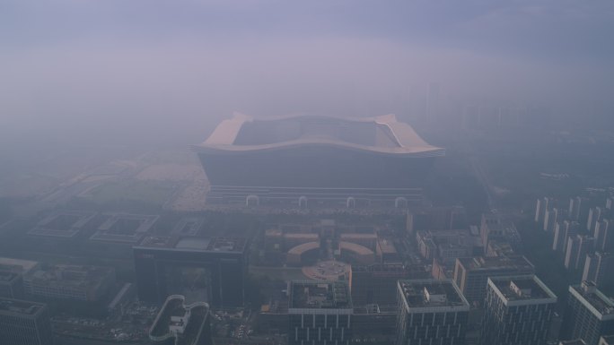 航拍雾霾中的成都高新区环球中心