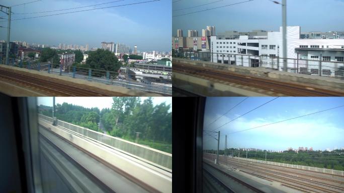 高铁即将抵达北京 窗外城市