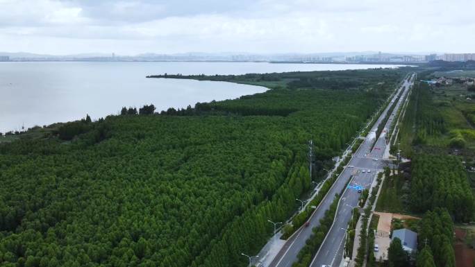 航拍昆明滇池捞鱼河夏天阴雨景色