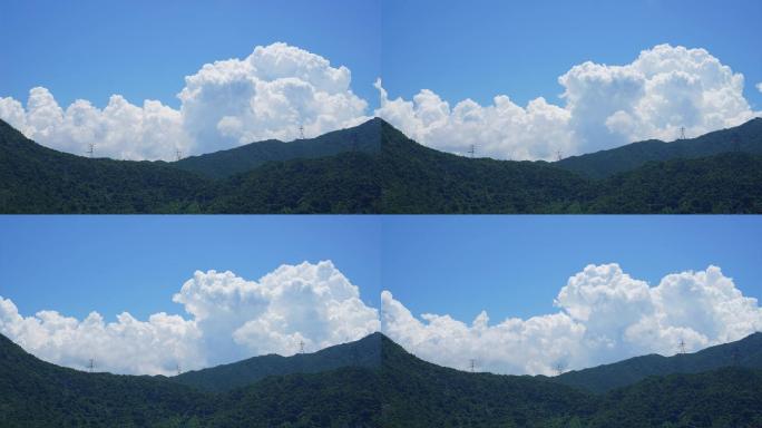 夏日晴天高山上白云飘动电线塔国家电网