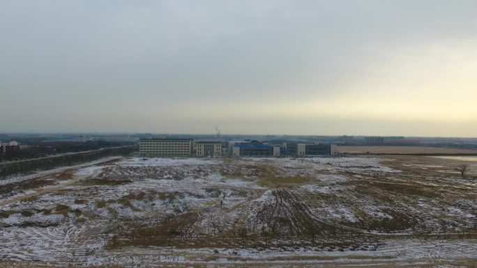 空地航拍雪天工地航拍荒地无人地航拍