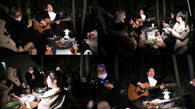 夜晚户外聚会露营音乐吉他弹唱气氛