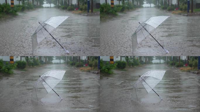 雨季雨点不断落在伞上