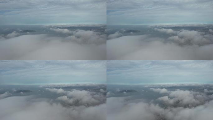 航拍山东威海城市上空的云海