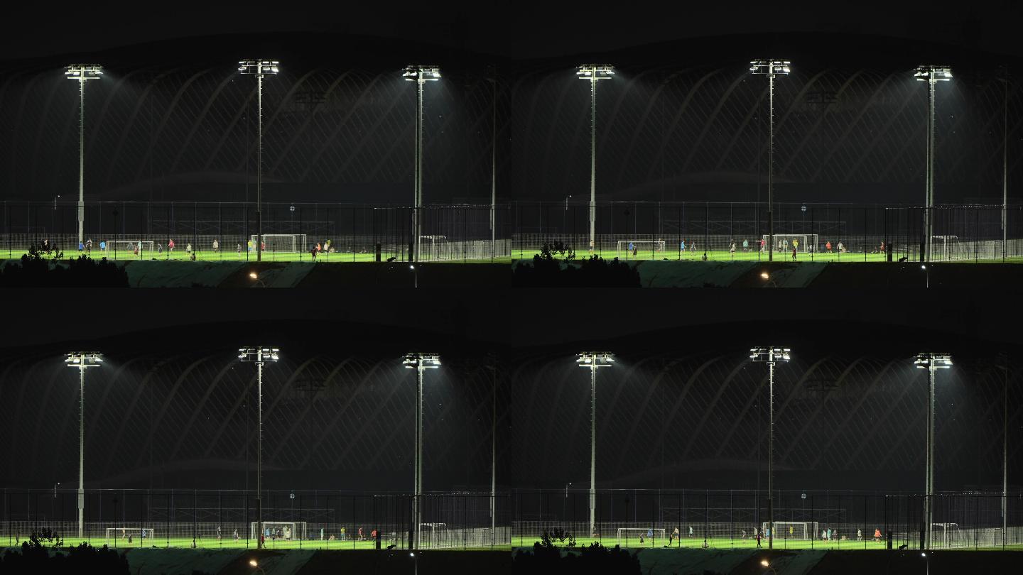 光谷网球中心旁的灯光足球场夜晚踢足球长焦