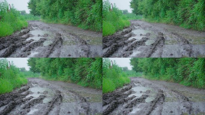 4k农村下雨天泥泞的道路积水