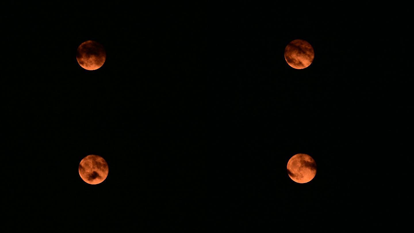 夜空中一轮红月亮升起