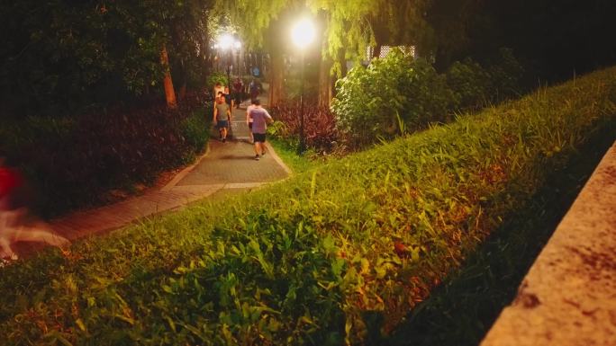 0180_D延时实拍公园夜晚小路步道锻炼
