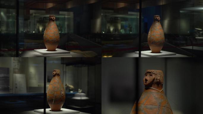 仰韶文化人头形器口彩陶瓶