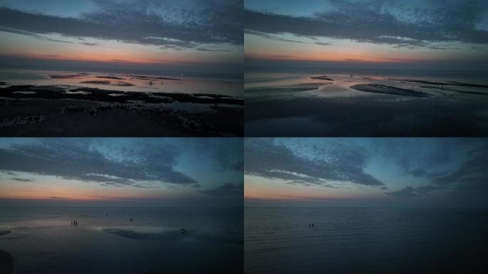 4K航拍盐城海边滩涂日出风景