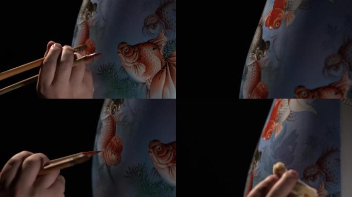 景德镇画瓷瓶绘制金鱼