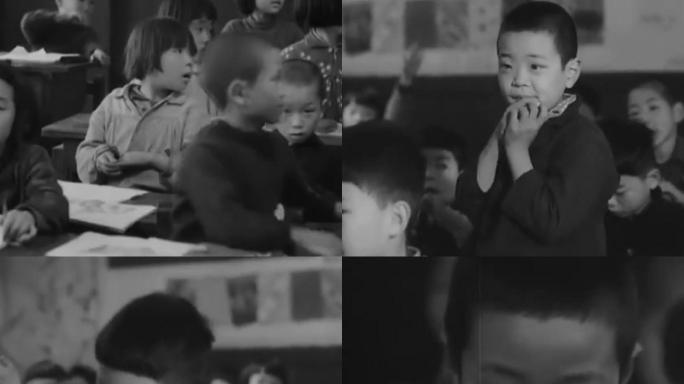 50年代小学生上课   举手回答问题