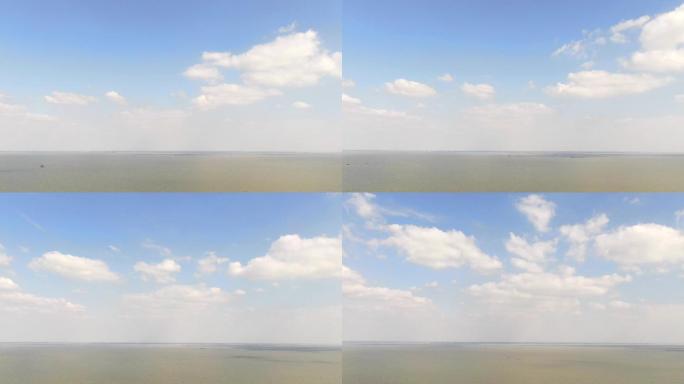 延时拍摄湖面流动的云
