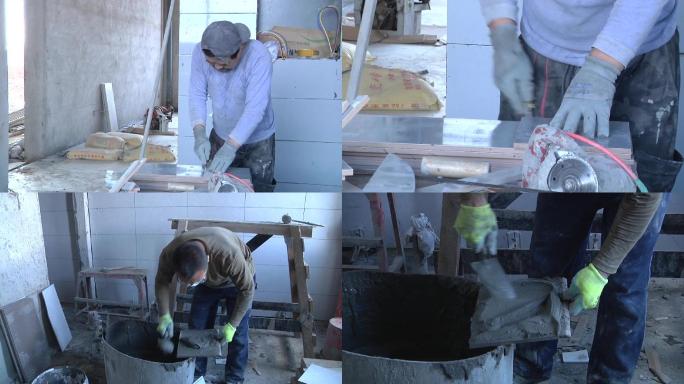楼房装修工人在室内抹水泥切割瓷砖