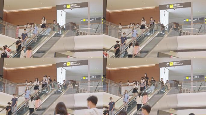 4K正版-天府机场航站楼乘坐扶梯的旅客